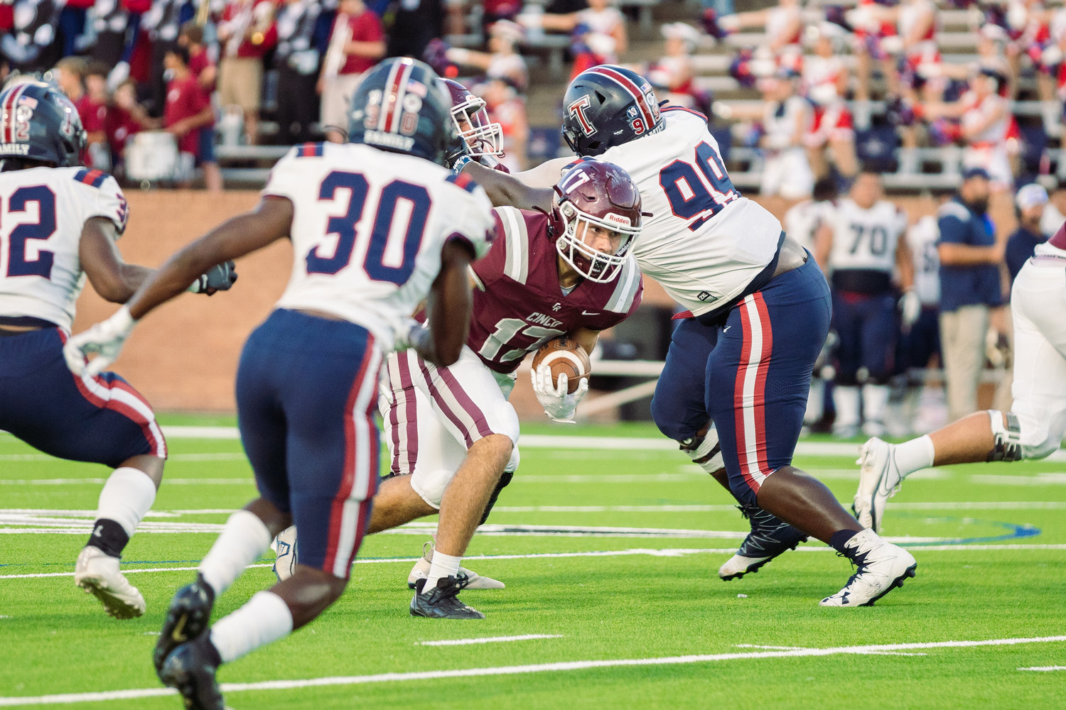 Cinco Ranch’s Eric Eckstrom runs the ball during Friday’s game between Cinco Ranch and Tompkins at Rhodes Stadium.